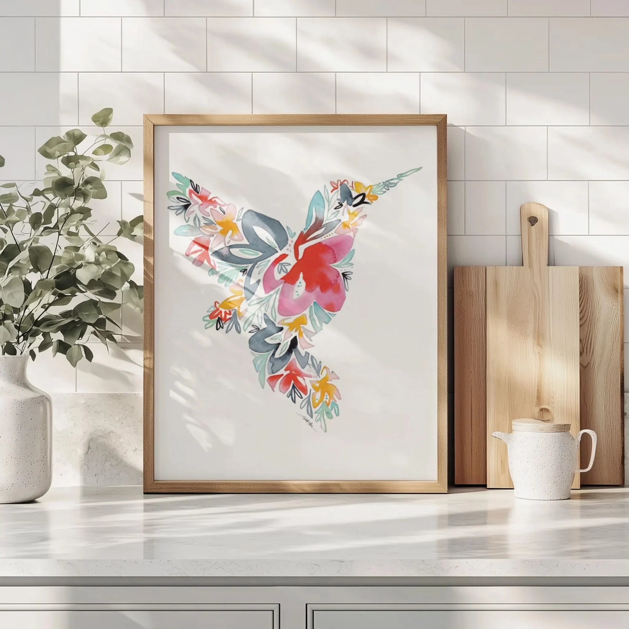 Framed floral hummingbird wall art print for kitchen decor, featuring watercolor flowers and modern design