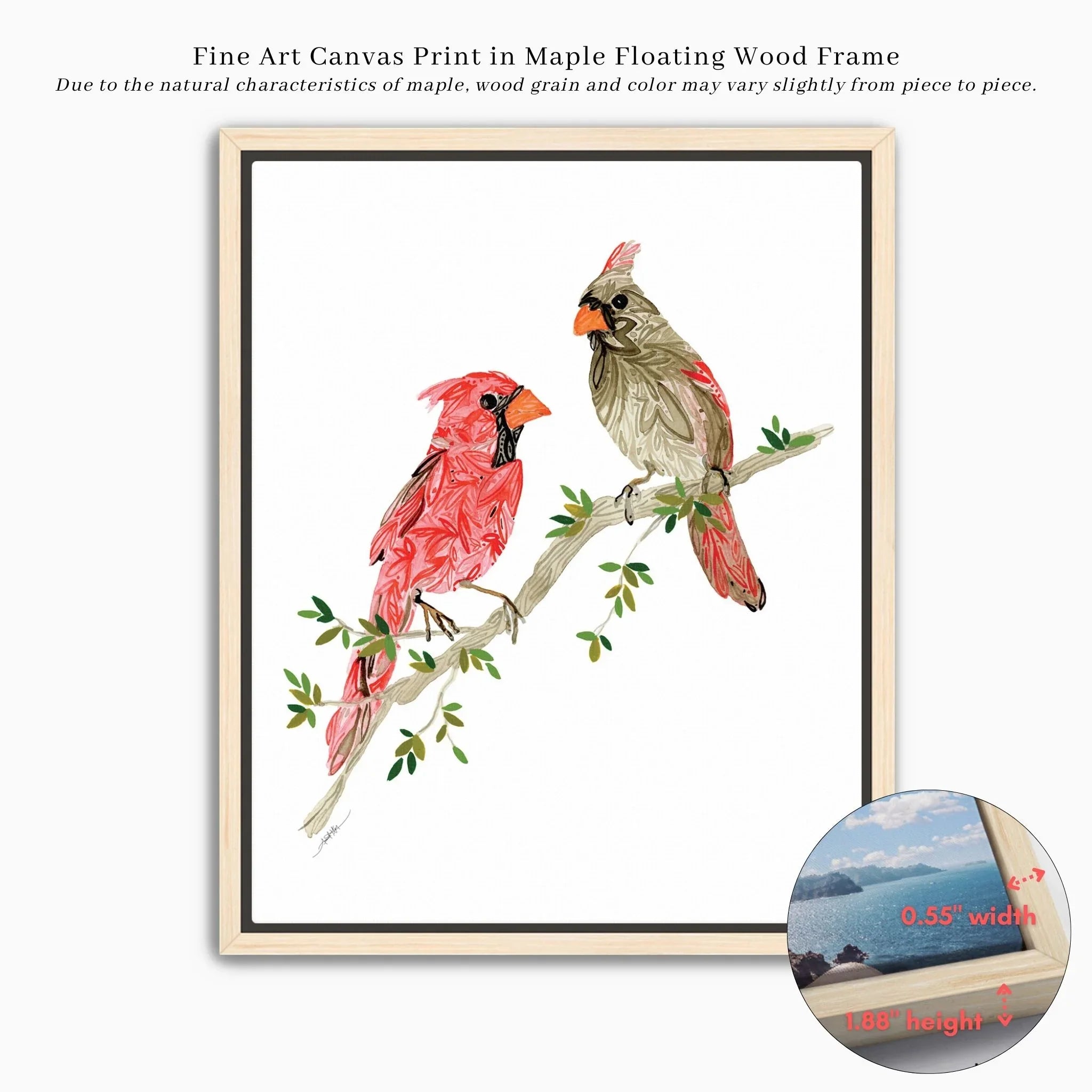 Fine art canvas print of two cardinals on a branch, framed in maple floating wood frame